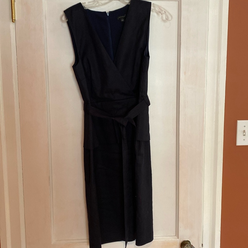 Ann Taylor linen sleeveless belted vneck peplum dress.  Knee length. Lined